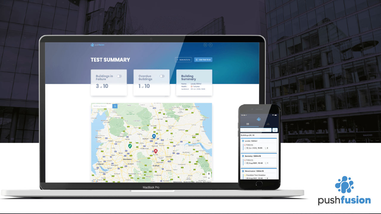 Image of pushfusion interface on a mac book and pushfusion mobile app on an Iphone. Background shows commercial buildings.